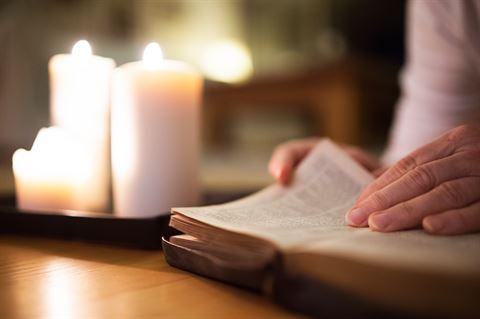Bible by candlelight